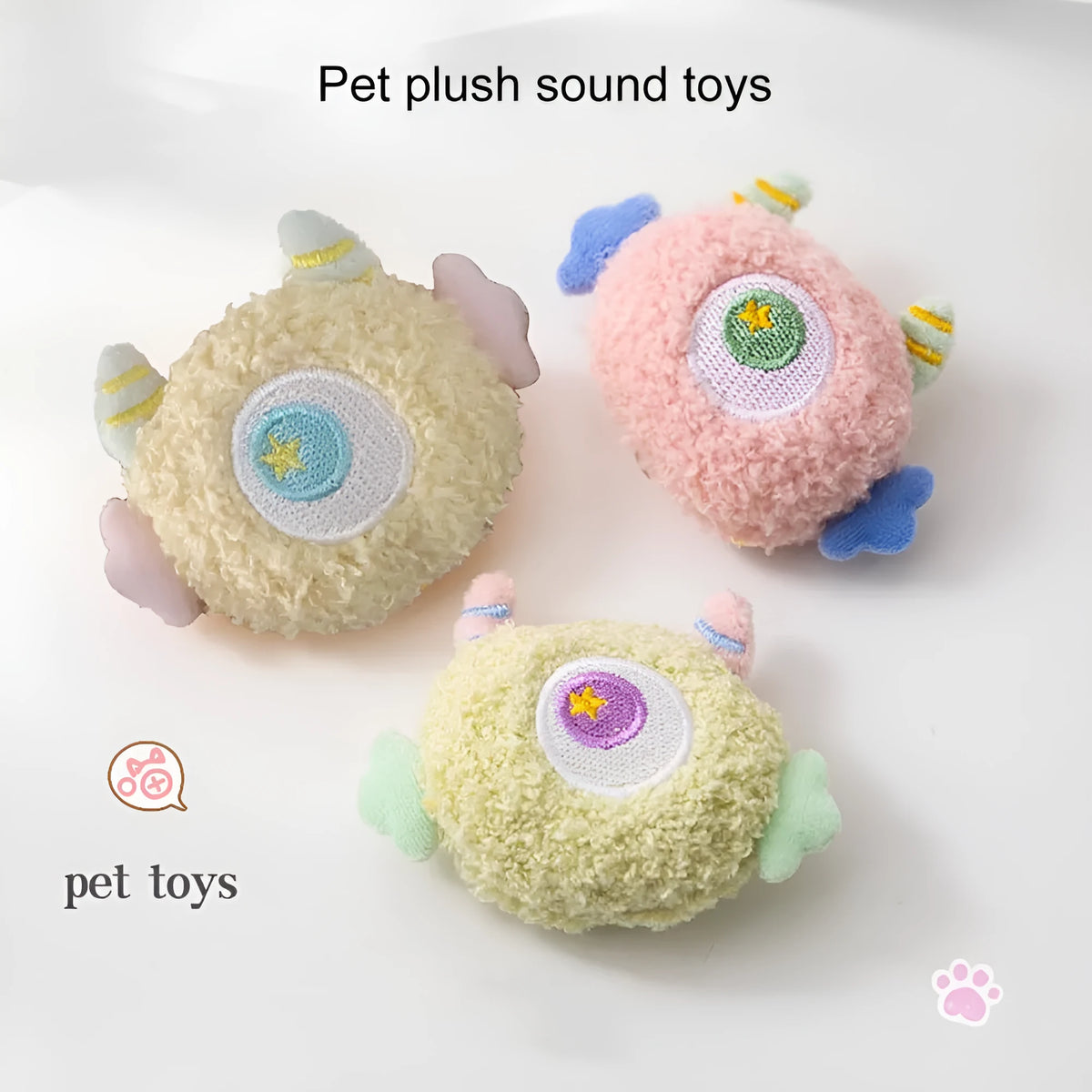 Plush cartoon dog chew toy with large eyes and squeaker in grey, green, pink, white or yellow