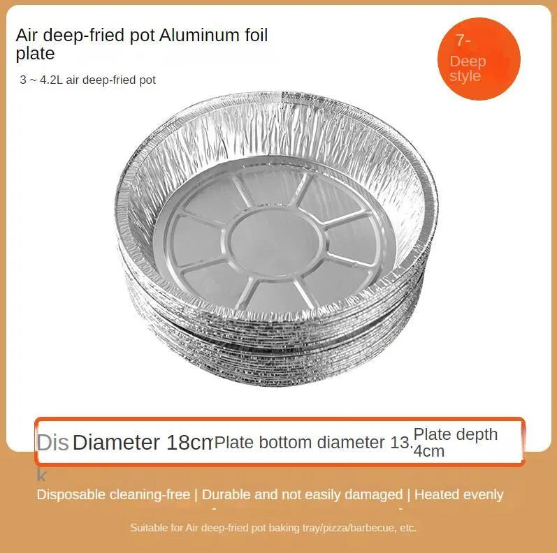 Round disposable aluminium foil liners for air fryers in four different sizes on a kitchen counter.
