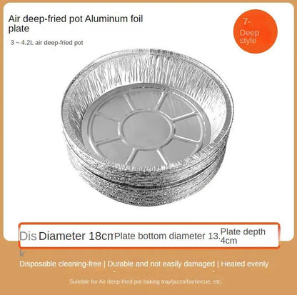 Round disposable aluminium foil liners for air fryers in four different sizes on a kitchen counter.