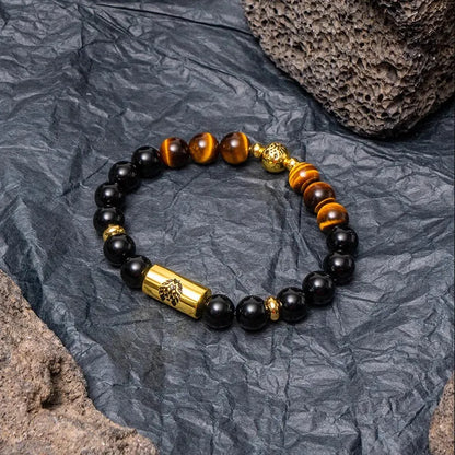 Little Lion ethnic geometric bracelet made from brown Bodhi seed beads on a wrist.