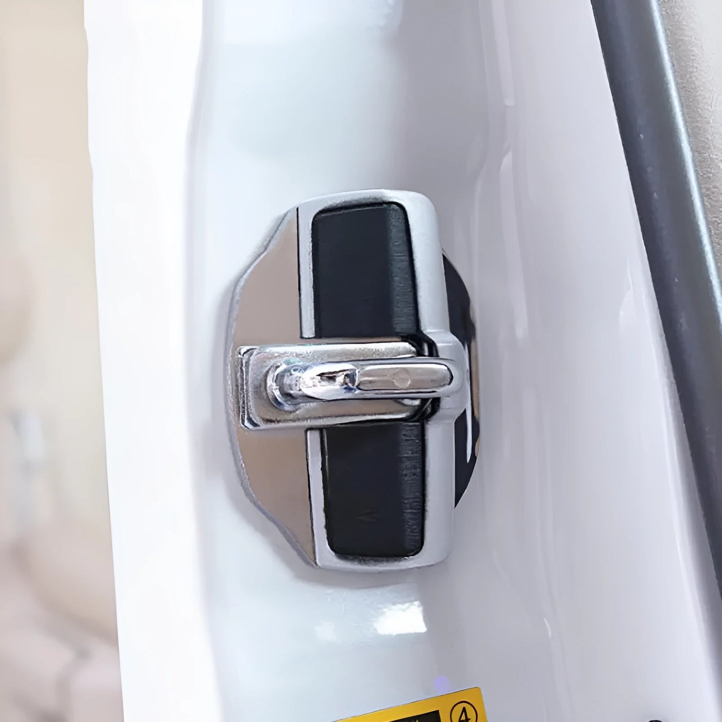 Silver TRD door lock cover and buffer cushion for Toyota Prius car door.