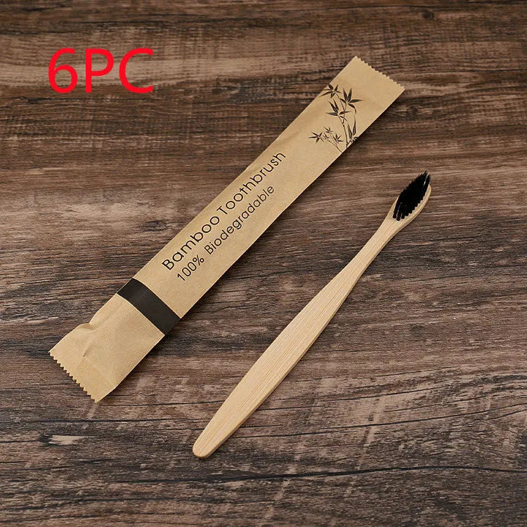 10 natural bamboo toothbrushes with charcoal bristles in six colours showing 17.5cm length