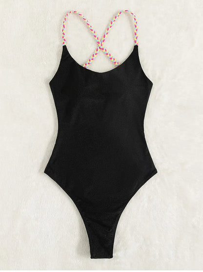 Black solid colour one-piece swimsuit with backless design and tight fit