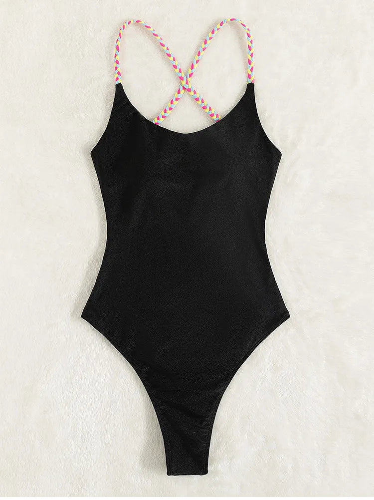 One-piece swimsuit for women in a solid colour black backless tight design made from nylon fabric and available in sleeveless sizes S M L XL with Asian sizing guidance provided