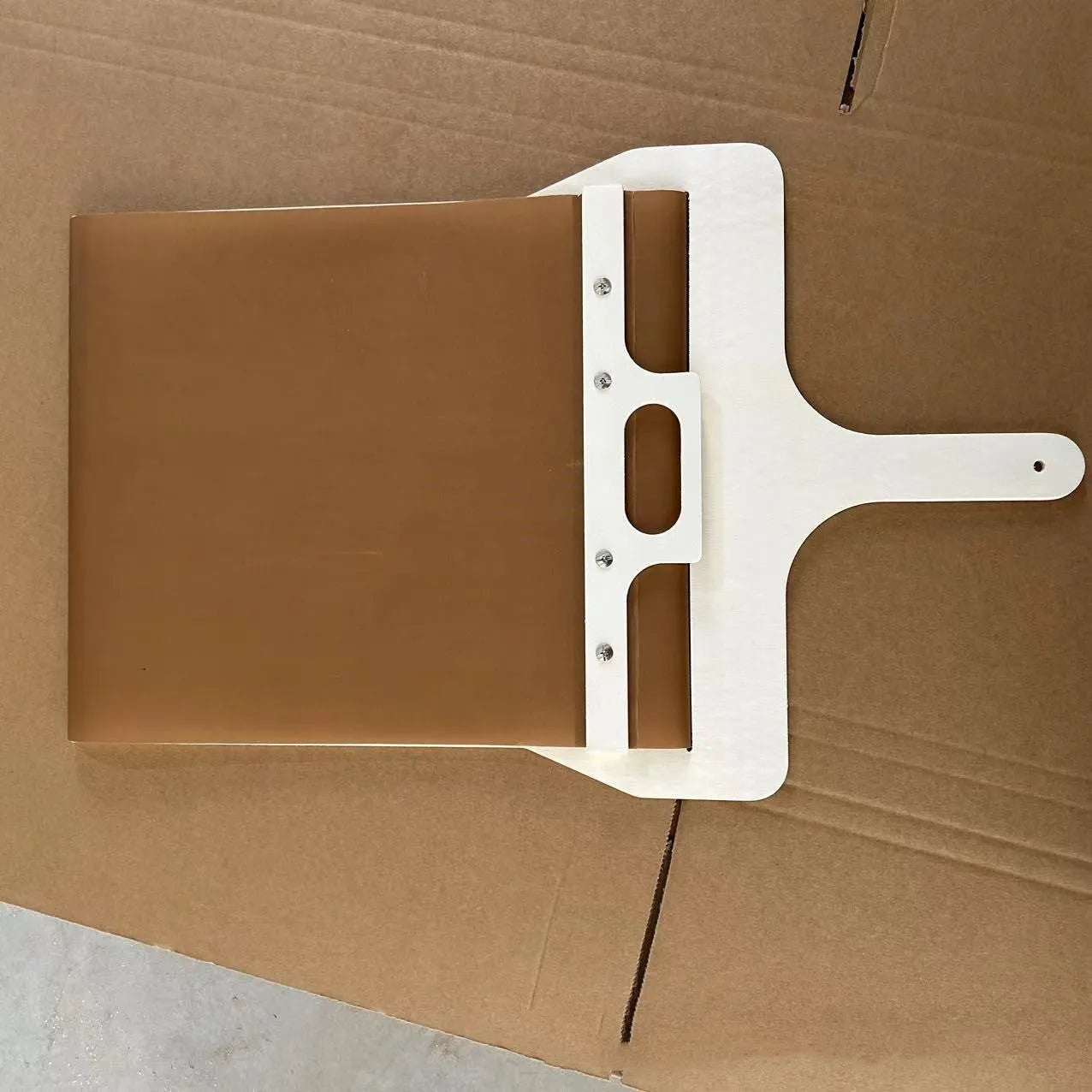 Wooden sliding pizza peel storage board in natural log colour with three size options.