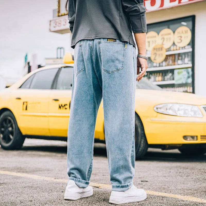 Men's loose straight jeans in dark blue colour showing relaxed fit and traditional styling