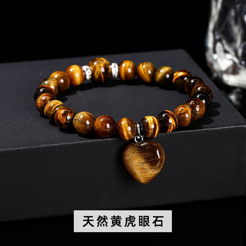 Handmade natural crystal bracelet with tigereye, aventurine, pink crystal, white jade and unakite stones