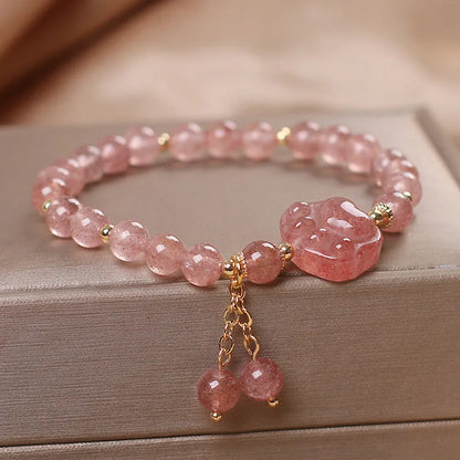 Red Cat's Eye Flower colour double-layer strawberry quartz crystal bracelet with lucky cat charm.