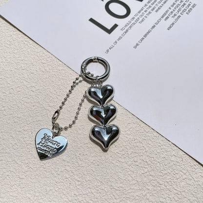 Acrylic peach-shaped key ring with love heart design and electroplated finish