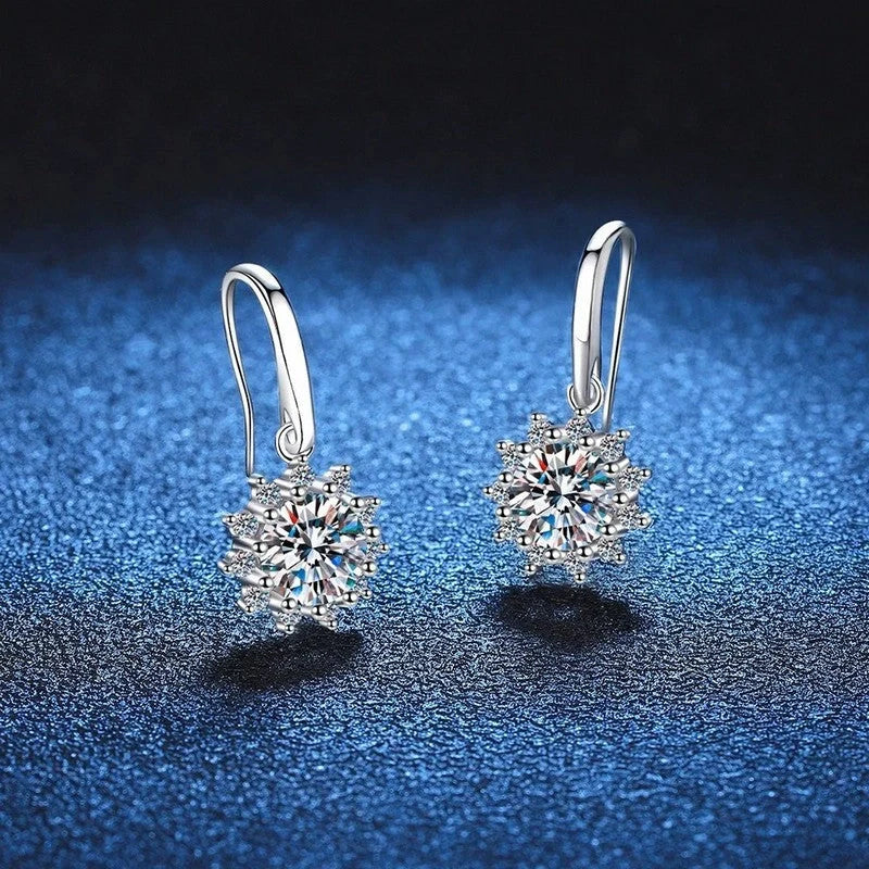 Elegant white gold sunflower stud earrings with a lustrous finish, a versatile accessory for the modern British woman