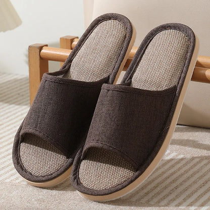 Women's open-toe linen slippers with thick sole in light brown colour.