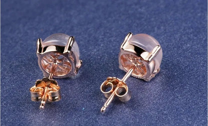 Women's simple Korean style drop shape stud earrings with synthetic ross quartz and rose gold finish.