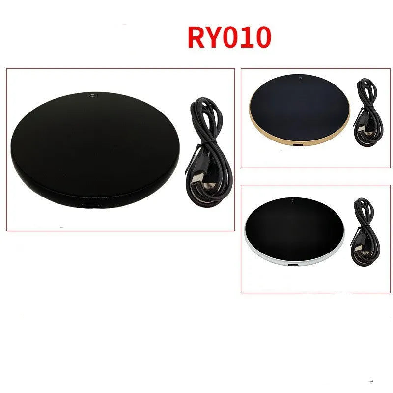 Black USB heating coaster with a mug on its tempered glass surface, showing a red LED indicator light.