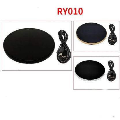 Black USB heating coaster with a mug on its tempered glass surface, showing a red LED indicator light.