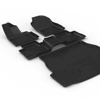 Black carbon fibre pattern tailored car boot liner mat fitted in an estate vehicle