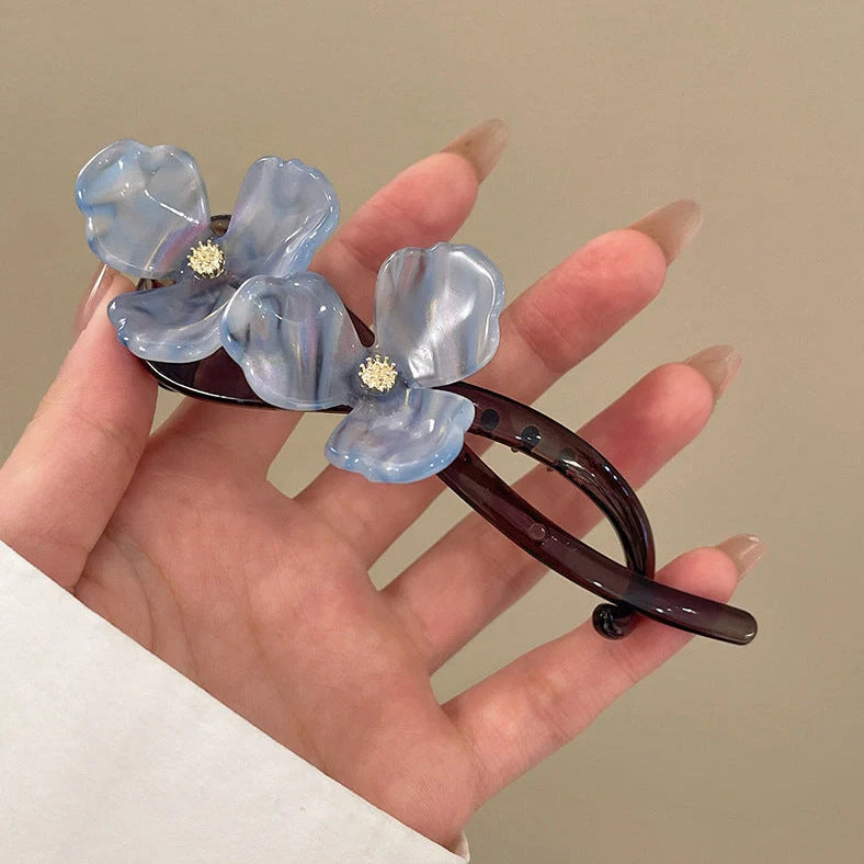 Retro flower bobby pin with acrylic petals in blue, light blue, beige, and pink colour options