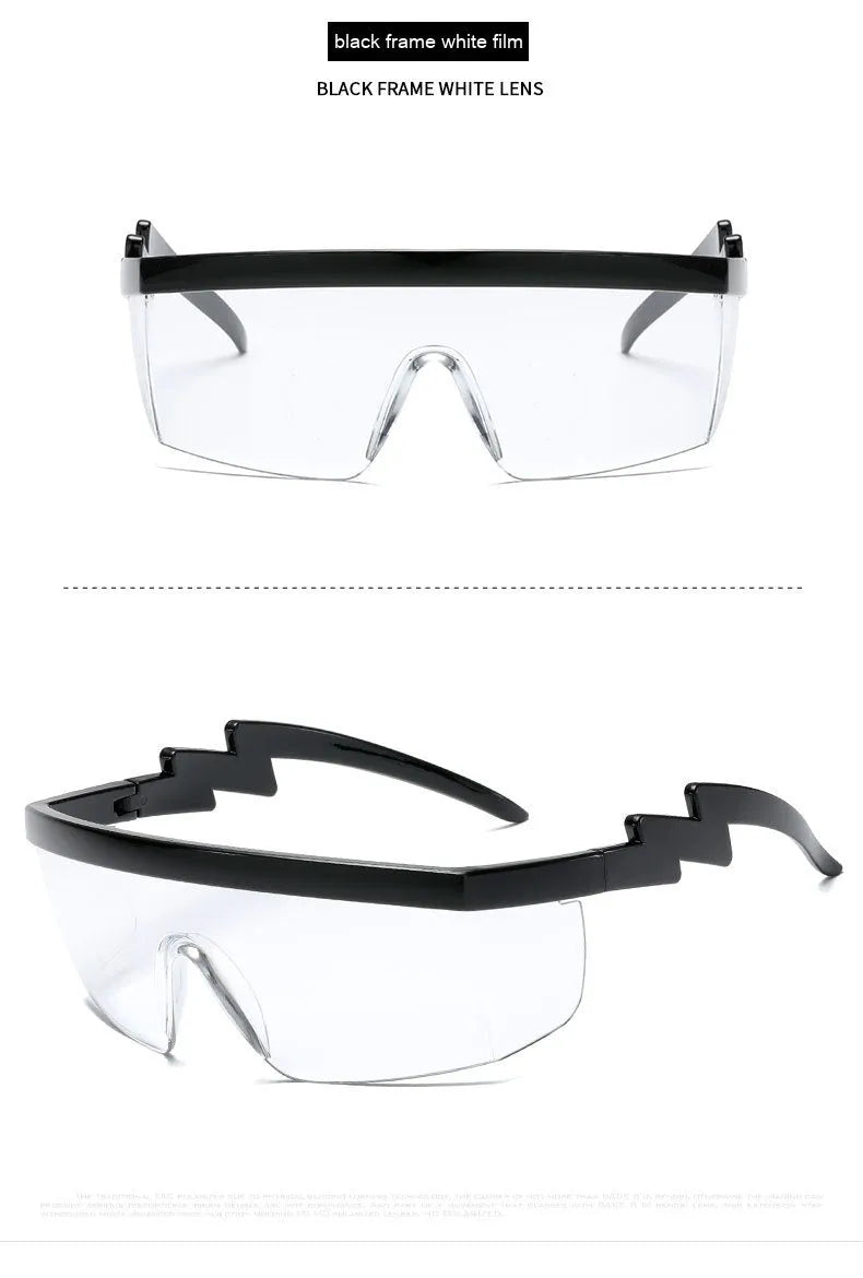 Black one-piece cycling sunglasses with blue polycarbonate lenses and lightning leg temples on a grey background.