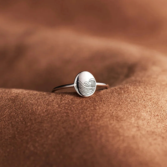 Sterling silver ring with elegant wave-inspired design, inspired by the natural beauty of the British coastline