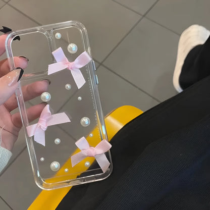 Transparent TPU iPhone case with three-dimensional pearl bow, anti-fall all-inclusive design, colour-matching finish