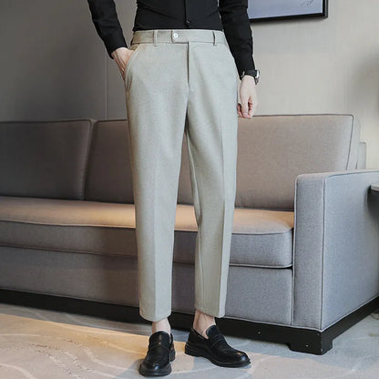 Straight-leg brown corduroy trousers with elastic waistband on size chart