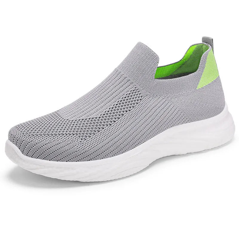 Women's Flyknit casual running shoes with soft PVC sole in black, grey, pink, and blue colour options.