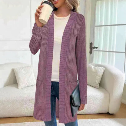 Long sleeve loose fit knitted cardigan jacket with side pockets, shown in grey.