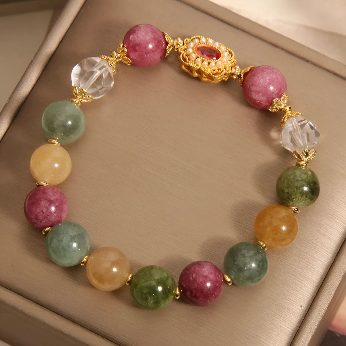 Jade colour tourmaline and alloy bracelet for women with pearl crystal base and rhinestones.