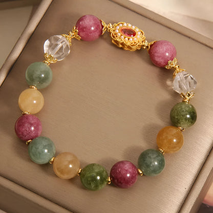 Jade colour tourmaline and alloy bracelet for women with pearl crystal base and rhinestones.