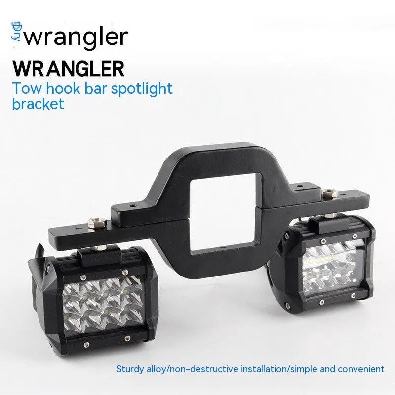 Jeep Wrangler LED reversing light bracket made from lightweight aluminium alloy, a black off-road accessory bracket for mounting reverse lamps on 4x4 vehicles, fits Wrangler models with secure single-unit packaging