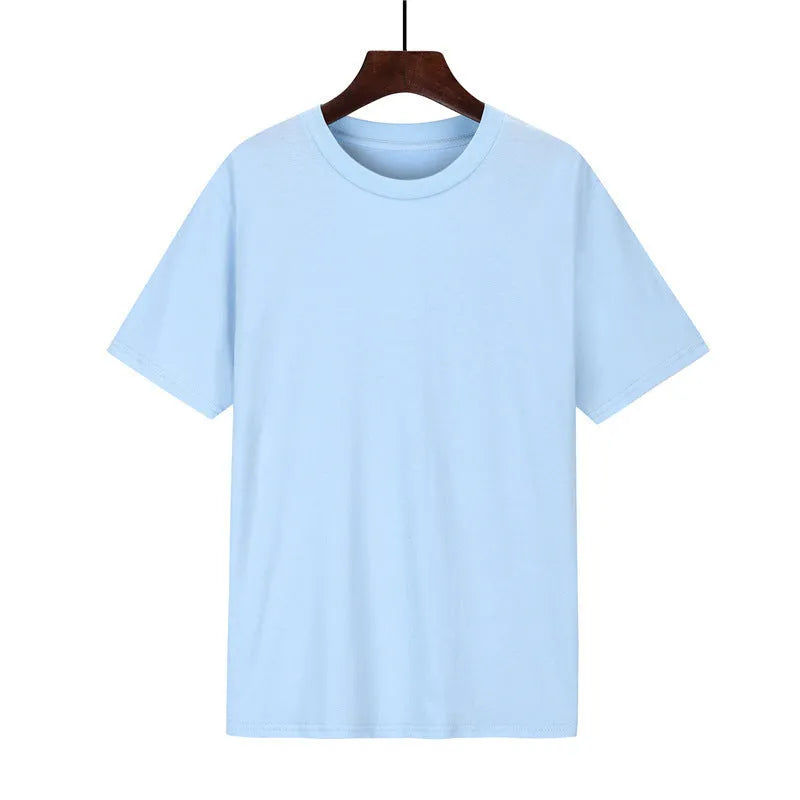A man's loose-fitting black cotton T-shirt with short sleeves on a hanger.