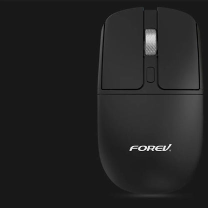 Compact wireless Bluetooth mouse with wireless charging, shown in grey colour on a desk.