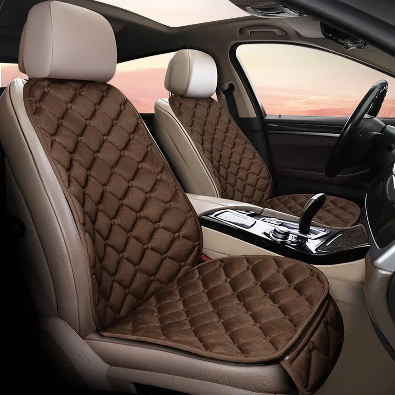Ringer plush cotton car seat cushion in burgundy colour on a car seat.