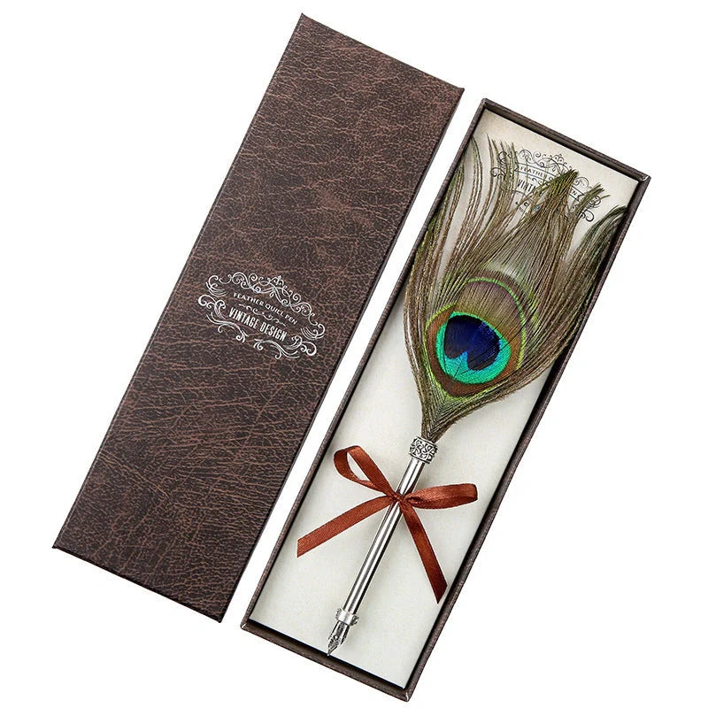 Elegant retro feather pen in a luxury gift box, featuring a sleek stainless steel casing and a stunning array of authentic feather designs.