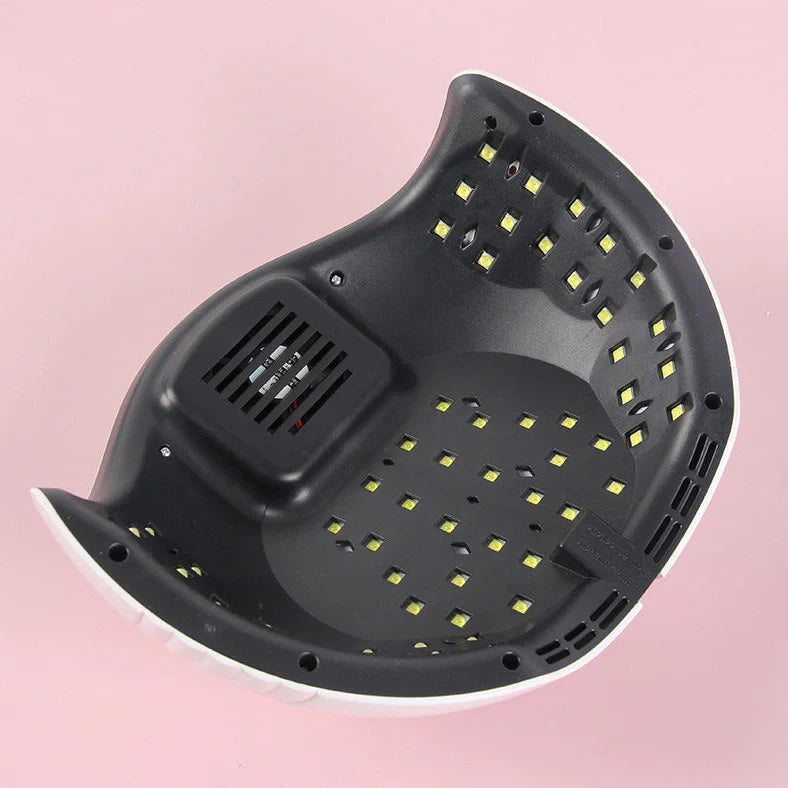 White nail phototherapy machine with LED display showing 60 lamp beads inside curing chamber