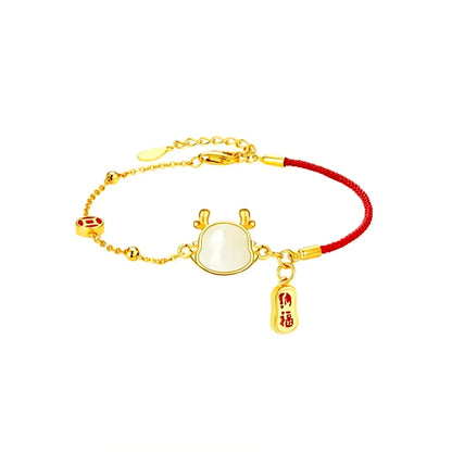 Silver-plated dragon zodiac bracelet for women with Hetian jade accents on a white background.
