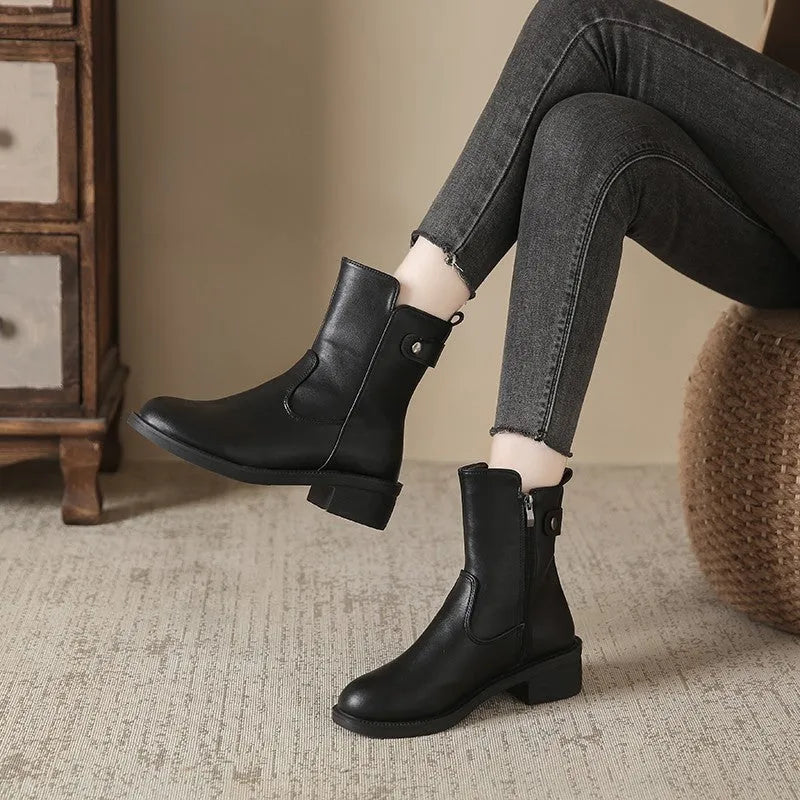 Women's low heel round toe boots with side zip in black artificial PU for casual wear, available in sizes 35 to 42 with a 1-3cm heel height and rubber sole construction