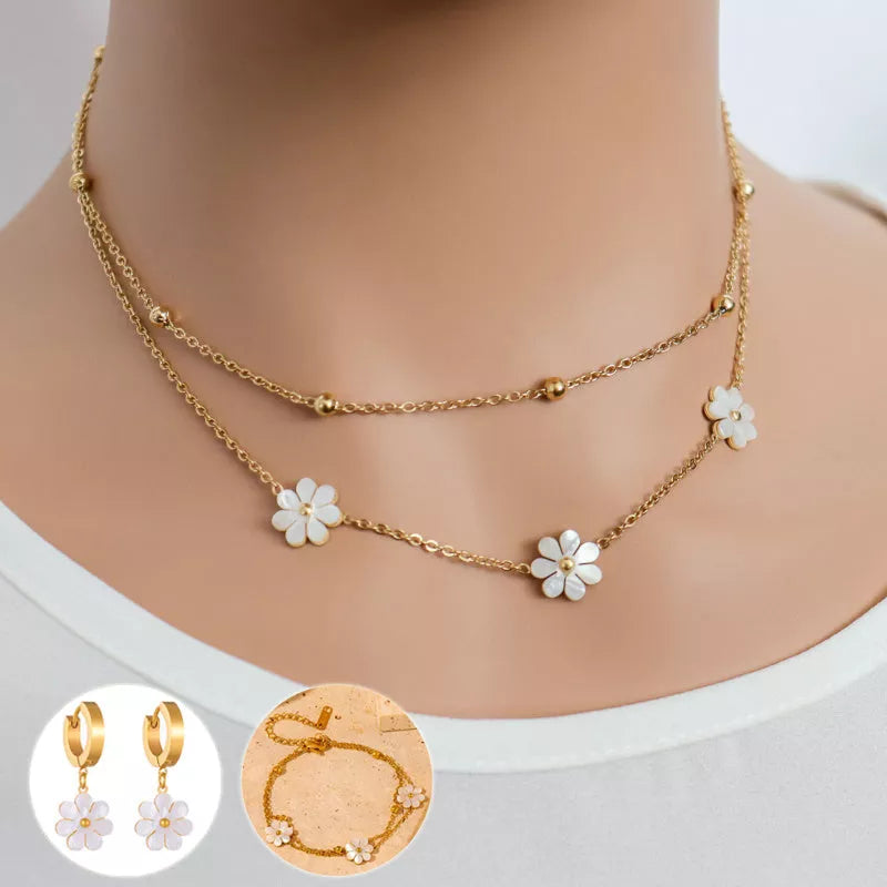 Stainless steel daisy flower jewellery set with necklace, bracelet, and earrings