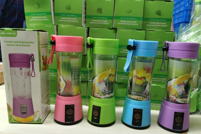Portable USB blender with six blades in pink colour option showing cup and charging cable