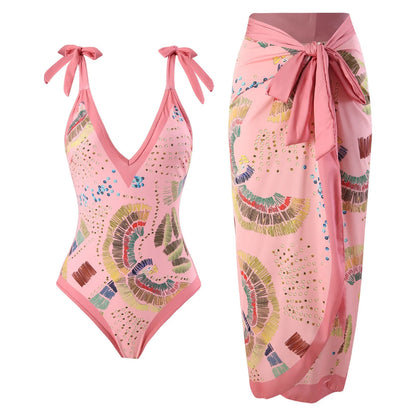 Blue French retro one-piece swimsuit with a detachable gauze skirt on a mannequin, backless design.