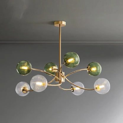 Modern Nordic-style chandelier with multiple green glass shades hanging at different heights.