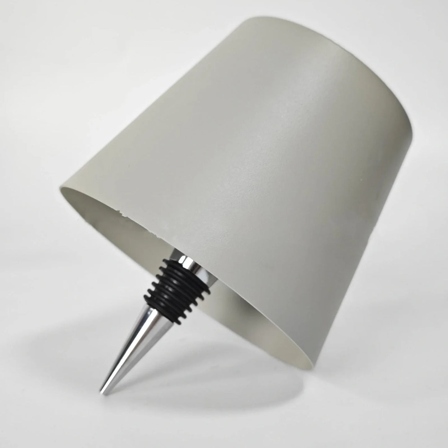 Wireless LED desk lamp in black tricolour finish, bottle-shaped with detachable base and touch control for 2000mAh powered lighting