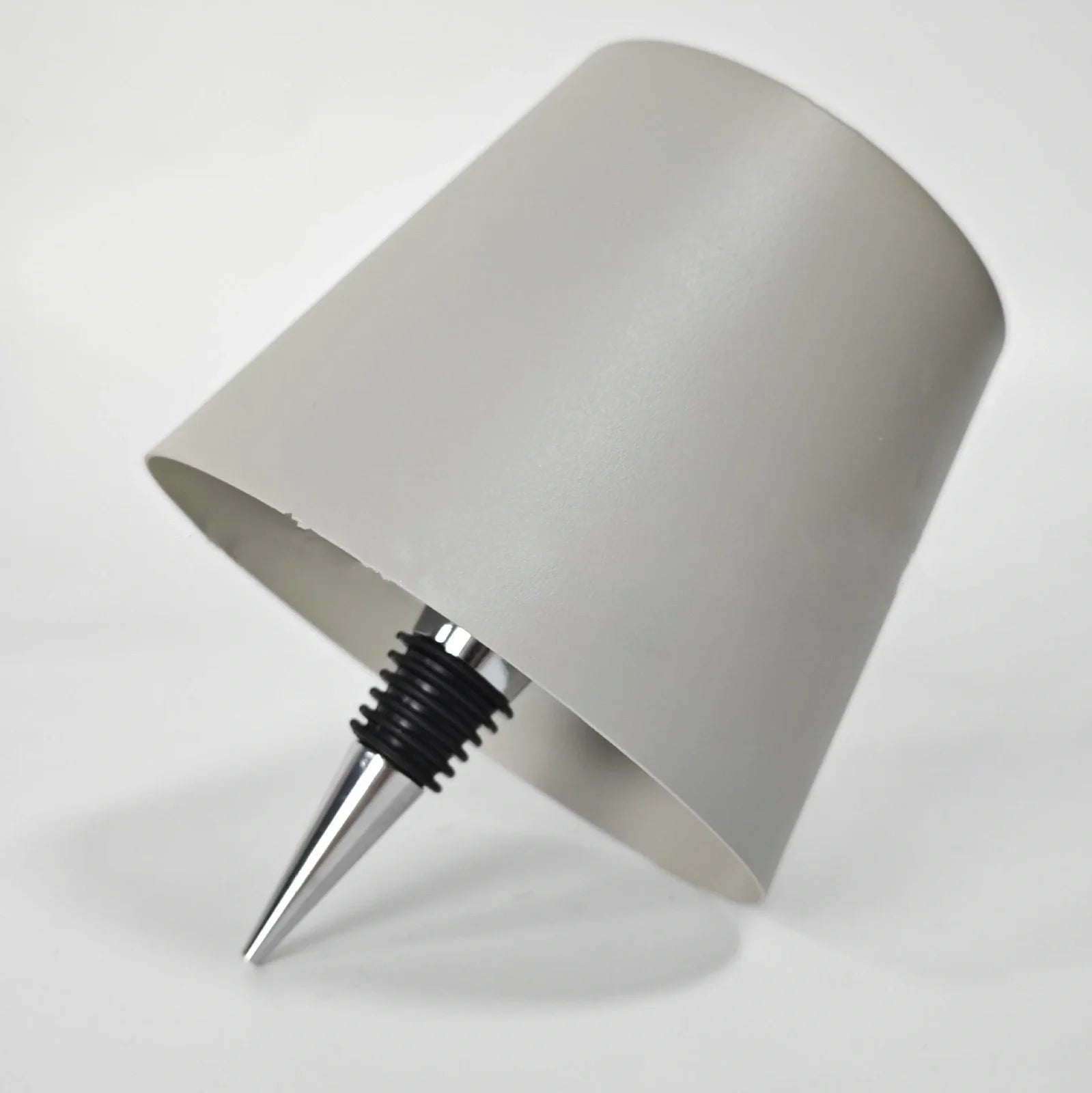 Wireless LED desk lamp in black tricolour finish, bottle-shaped with detachable base and touch control for 2000mAh powered lighting