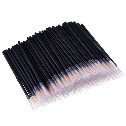 Pack of 100 black-handled disposable eyeliner brushes with ultra-fine tips and clear plastic sleeves.