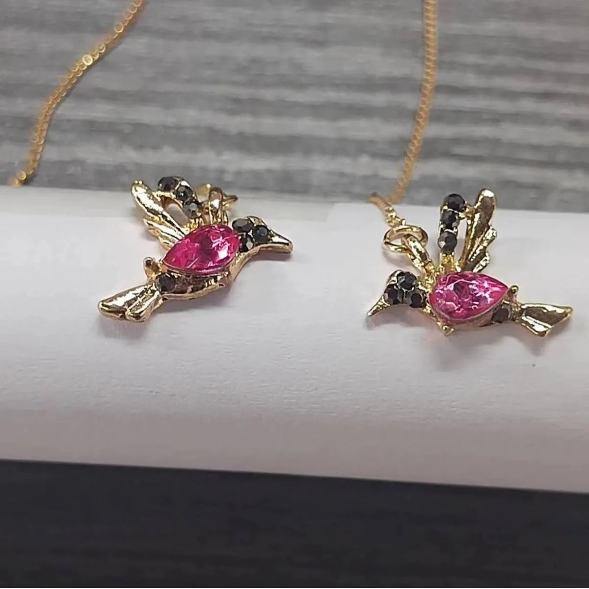 Long drop bird design earrings with mixed zirconium wings in red, blue, or red lvzuan colour options.