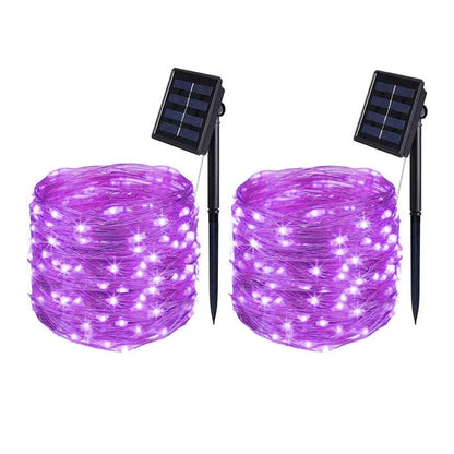 Waterproof solar Christmas courtyard lamp in purple or orange with cartoon modelling for holiday decoration