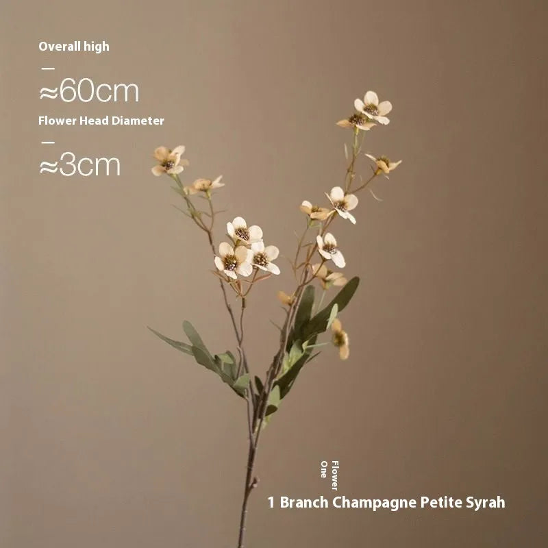 Bundle of four artificial dried flowers in orange, white, pink, and champagne colours for rustic decor