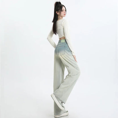 Women's gradient blue denim straight-leg trousers with 100% cotton fabric, showing colour transition and straight-leg silhouette