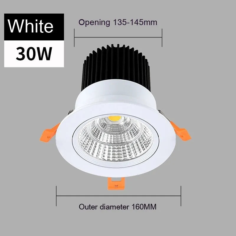 Modern aluminium recessed LED ceiling spotlight with three colour temperature settings shown installed.