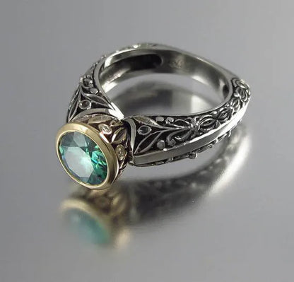 Gold-plated flower-shaped vintage ring with colour separation in green silver on alloy base