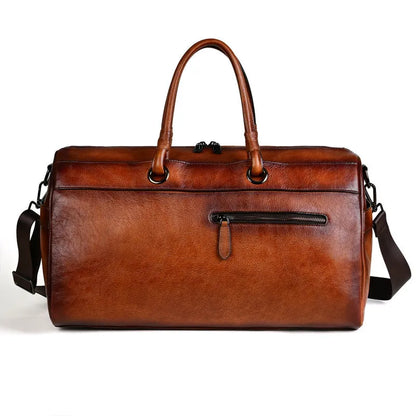 Handmade brown retro leather tote bag with large capacity for travel.